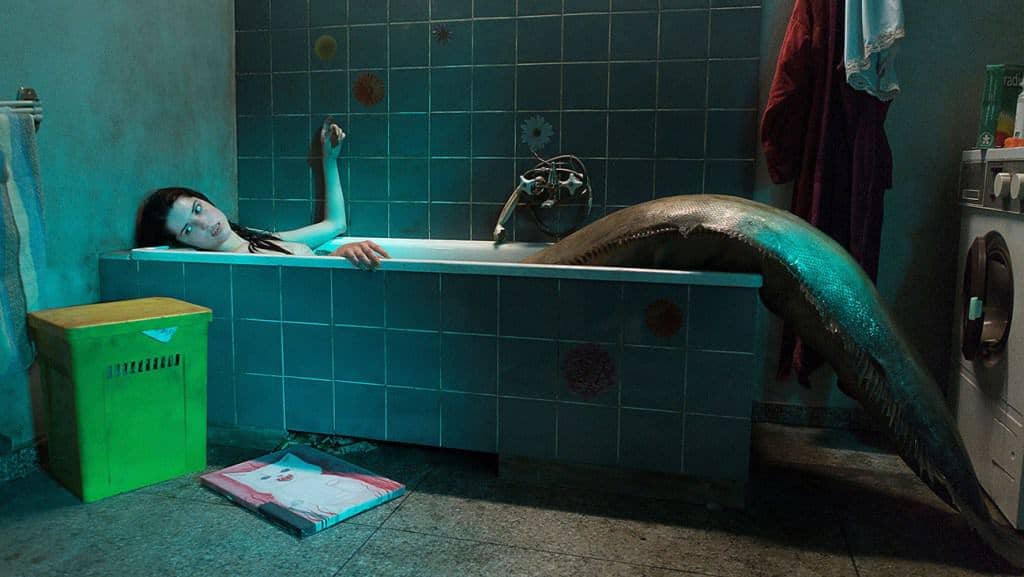 Mermaids sing and eat people in a red band trailer for the lure film 
